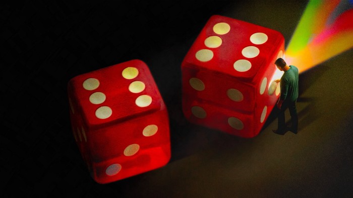 Illustration of two dice with the six sides facing up and a man removing a white dot from the five on the side of one die. A rainbow light is coming out of the hole.
