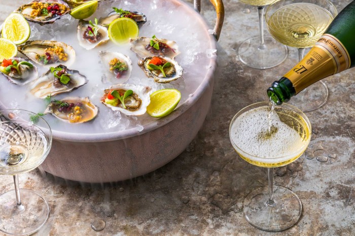 Oysters served three ways at the start of an evening meal