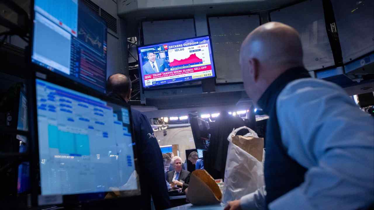 Traders work on the floor of the New York Stock Exchange (NYSE) in New York, US, on Thursday, April 3, 2025