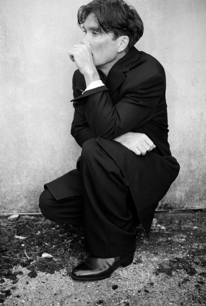 Cillian Murphy wears Versace wool tailored coat, £2,310, and wool trousers, £810. John Lobb leather Freddi boots, £1,940