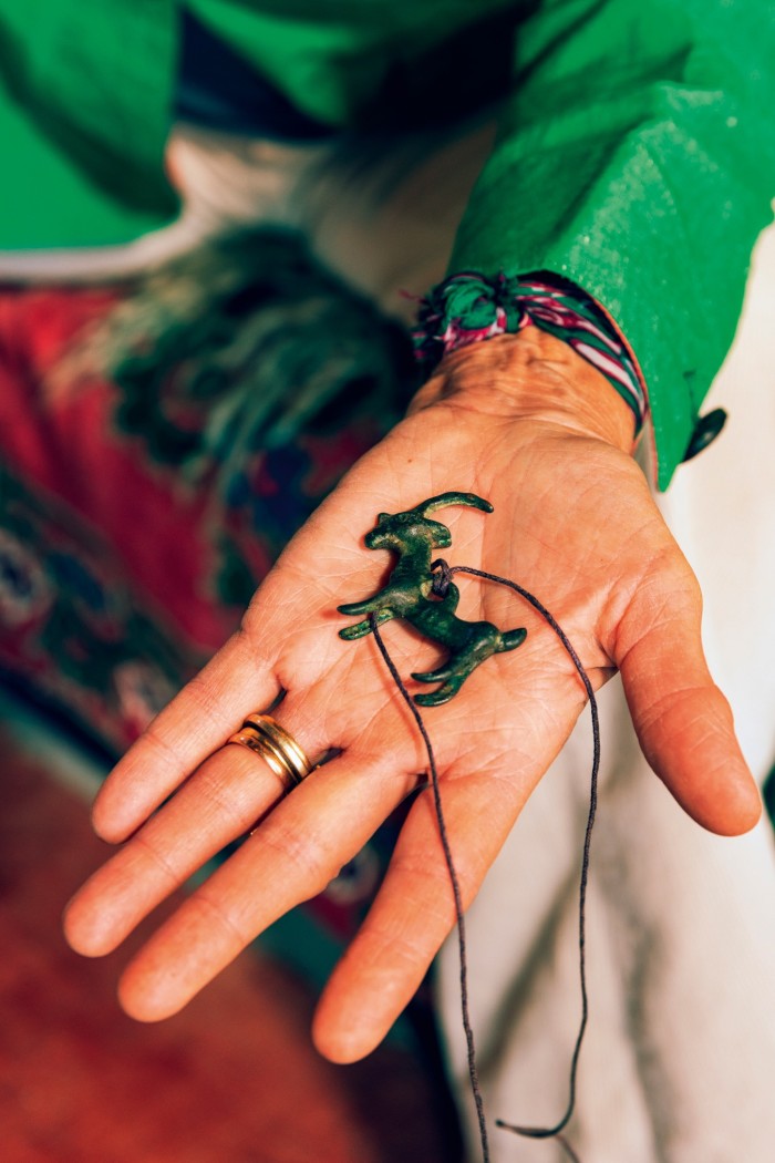 Her 3,000-year-old Luristan bronze goat pendant
